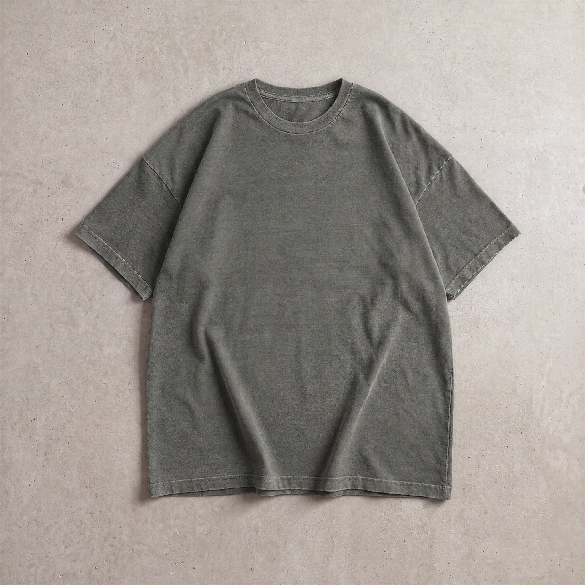 Cotton Collective Vintage Asphalt 6.0 oz Tour S/S Tee, styled flat lay