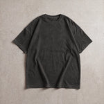 Cotton Collective Vintage Black 6.0 oz Tour S/S Tee, styled flat lay