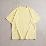 Cotton Collective Vintage Ivory 6.0 oz Tour S/S Tee, styled flat lay