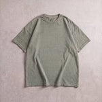 Cotton Collective Vintage Sand 6.0 oz Tour S/S Tee, styled flat lay