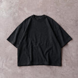 Cotton Collective Slub Pirate Black Drop Crop S/S Tee 7.0oz, laid flat on concrete