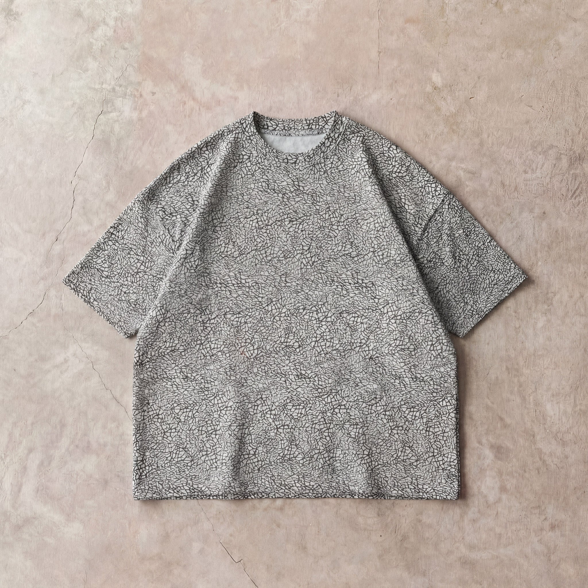 Cotton Collective Vintage Elephant Oversized Box S/S Tee 7.5oz, laid flat on concrete