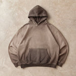 Cotton Collective Chocolate Oil Wash Special Hoodie 14oz, laid flat on concrete